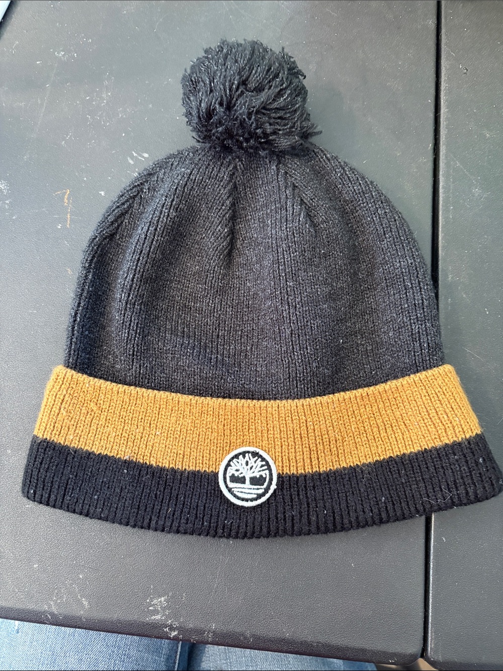 Timberland Kids Black and Mustard Pom Pom Knit Beanie